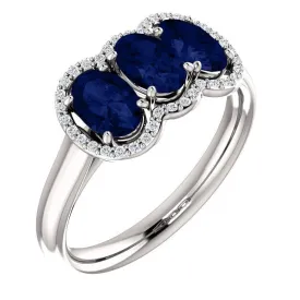 14KT GOLD 2.10 CTW SAPPHIRE & 0.10 CTW DIAMOND 3 STONE OVAL HALO RING